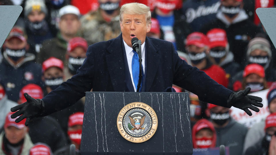 U.S. President Donald Trump addresses thousands of supporters during a campaign rally at Capital Region International Airport October 27, 2020 in Lansing, Michigan. (Chip Somodevilla/Getty Images)