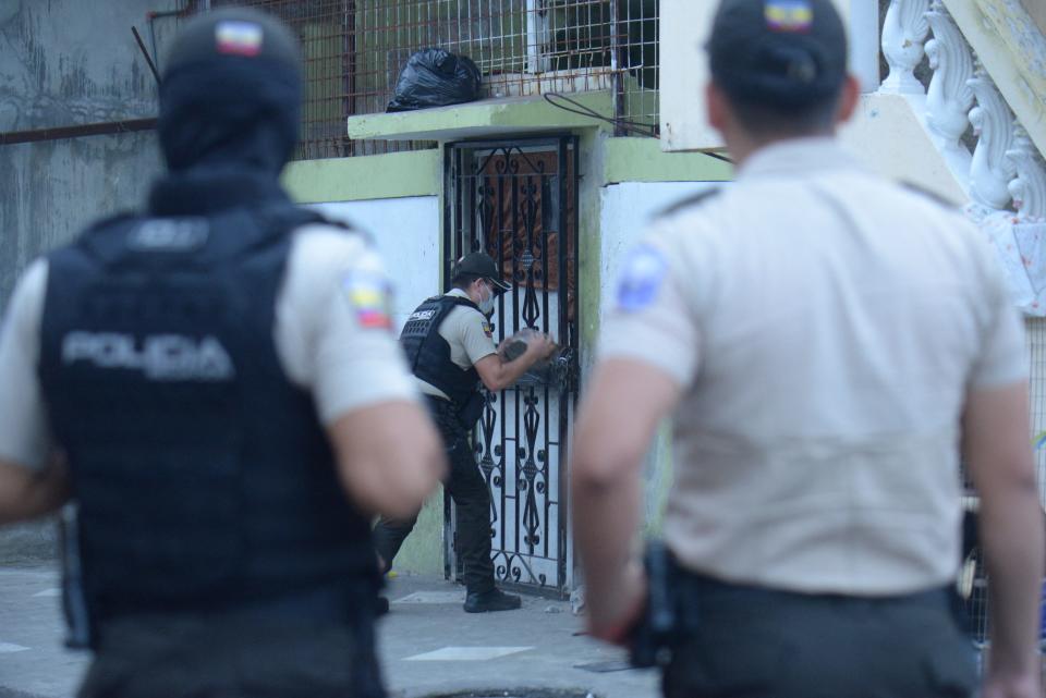 Police run a search operation that led to three people being detained in Guayaquil, Ecuador, on Jan. 27, 2024.