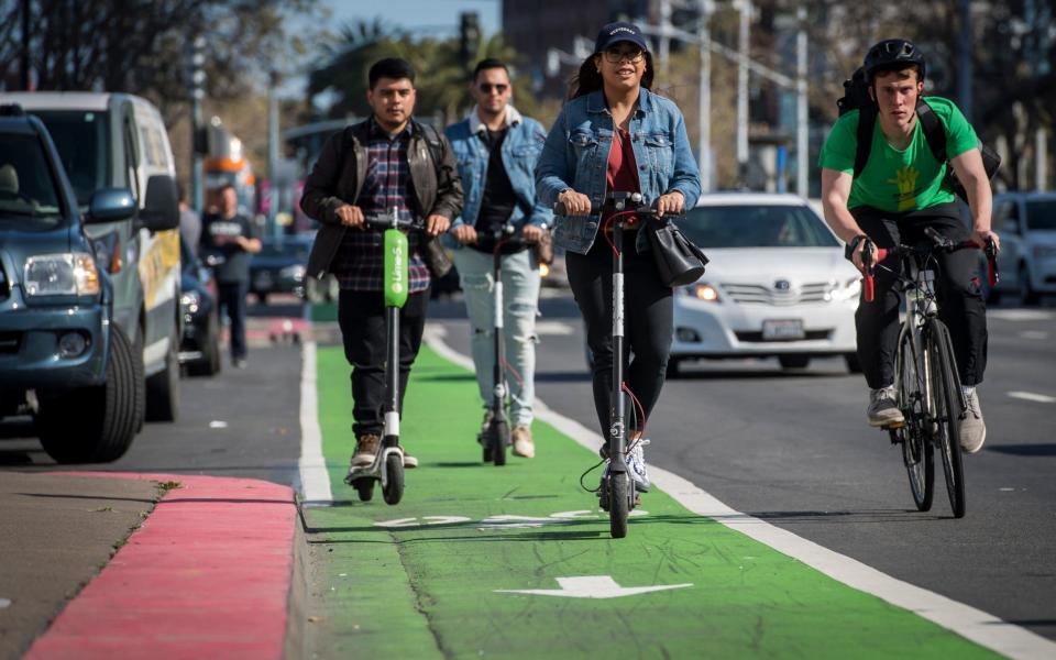 Electric scooter sharing companies are popular in San Francisco. - Bloomberg