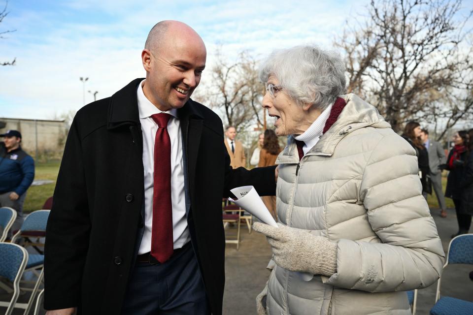 Gov. Spencer Cox talks with Pamela Atkinson, adviser to the governor, after he unveiled the state’s fiscal year 2025 homelessness plan at a press conference at Atherton Community Treatment Center in West Valley City on Monday, Dec. 4, 2023. | Scott G Winterton, Deseret News