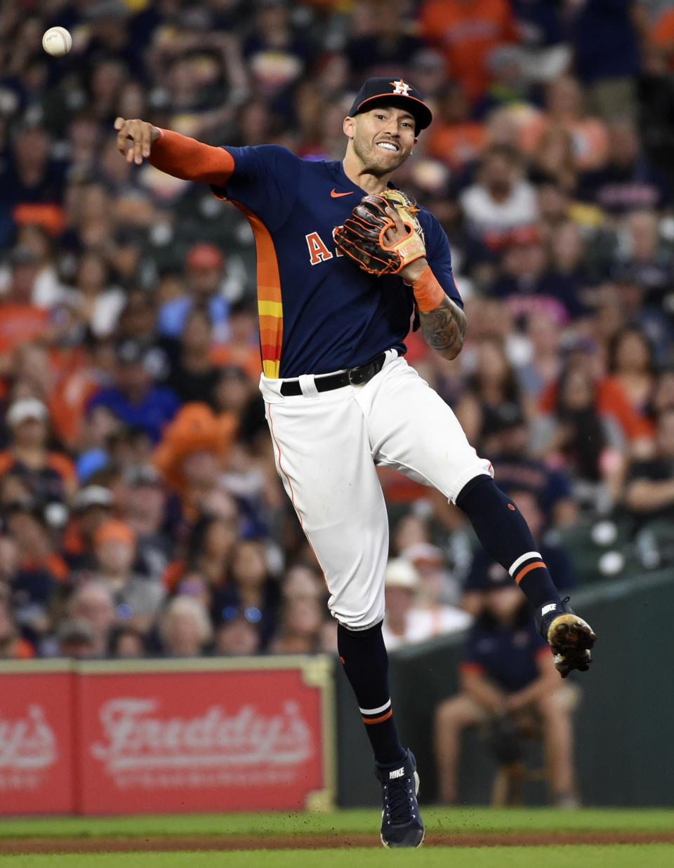 Houston Astros shortstop Carlos Correa throws out Chicago White Sox's Tim Anderson during the fifth inning of a baseball game, Saturday, June 19, 2021, in Houston. (AP Photo/Eric Christian Smith)