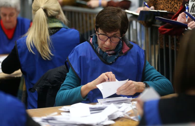 The first ballot boxes are opened at the count centre, Titanic Quarter, Belfast, Northern Ireland