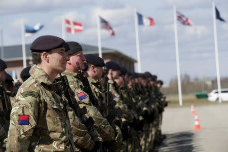 British sodiers prepare for the official ceremony welcoming the deployment of a multi-national NATO battalion in Tapa, Estonia, April 20, 2017. REUTERS/Ints Kalnins