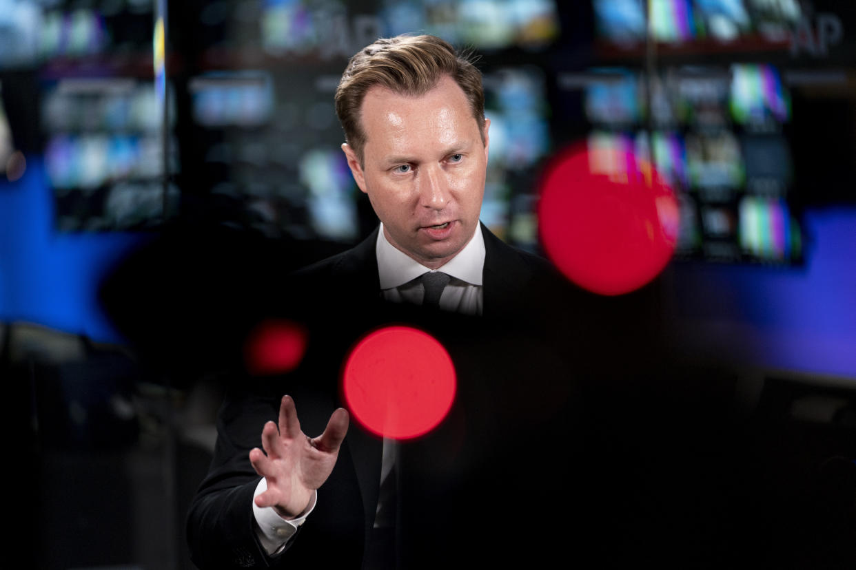 Andrew Adams, director of the Justice Department's KleptoCapture task force, designed to enforce the economic restrictions imposed on Russia and its billionaires, speaks to the Associated Press in an interview at the AP bureau in Washington, Wednesday, March 1, 2023. (AP Photo/Andrew Harnik)