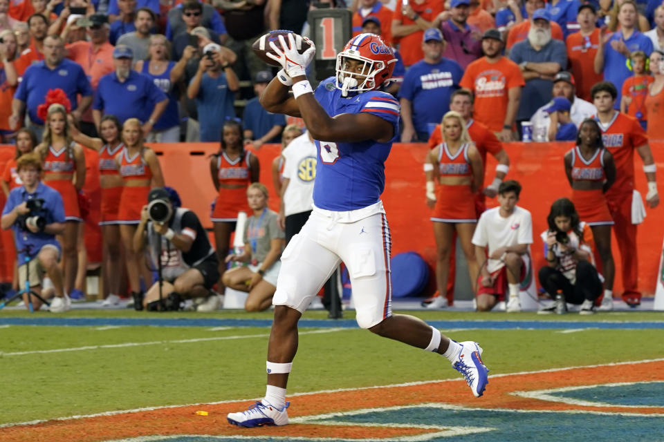 Florida tight end Arlis Boardingham makes a reception for a touchdown on a 6-yard pass play against Charlotte during the first half of an NCAA college football game, Saturday, Sept. 23, 2023, in Gainesville, Fla. (AP Photo/John Raoux)