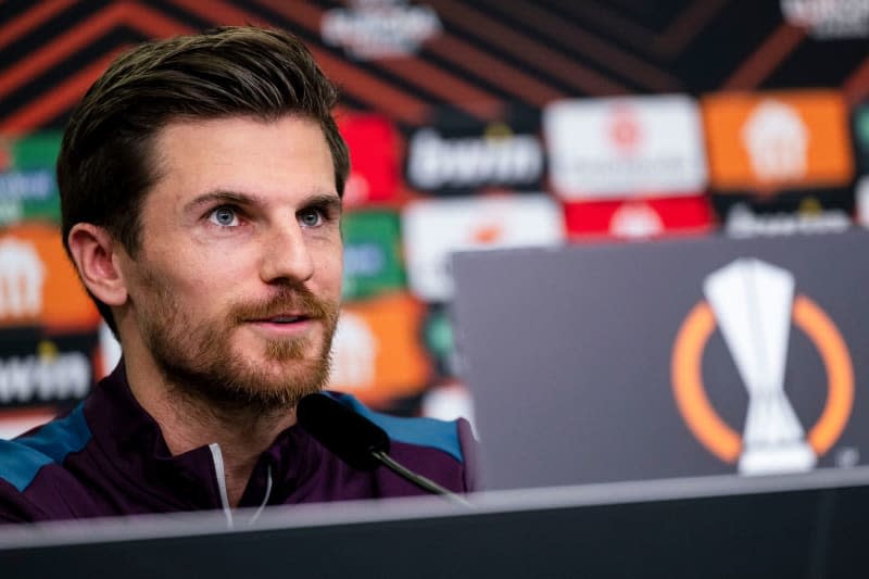 Leverkusen's Jonas Hofmann smiles during a press conference, ahead of the UEFA Europa League soccer match against FK Karabakh Agdam. Bayer Leverkusen players are not getting carried away after a superlative first part of the season without defeat, forward Hofmann said after 04 January training. Marius Becker/dpa