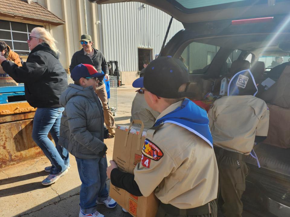 More than 50 area Boy Scout troops work to deliver food donations to the High Plains Food Bank Distribution Center on Saturday morning during their 2023 Scouting for Food event.