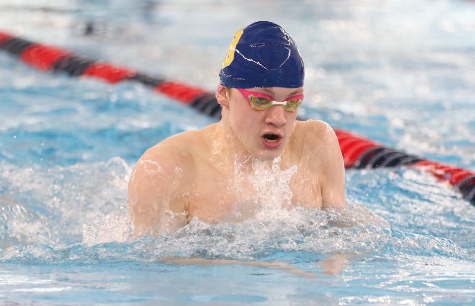 Christopher Bartmess of South Bend Riley competes in the 100 Yard Breaststroke during the NIC Boys Swimming Finals Saturday, Jan. 28, 2023 at the Elkhart Aquatics Center.