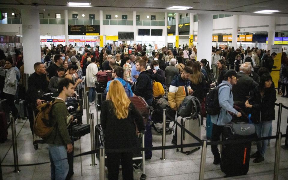  Travellers queue to check in for their flights at Gatwick Airport in London, Britain, 31 May 2022. Holidaymakers across the UK face continuing travel disruptions due to flight cancellations and lack of airport and airline staff - TOLGA AKMEN/EPA-EFE/Shutterstock 