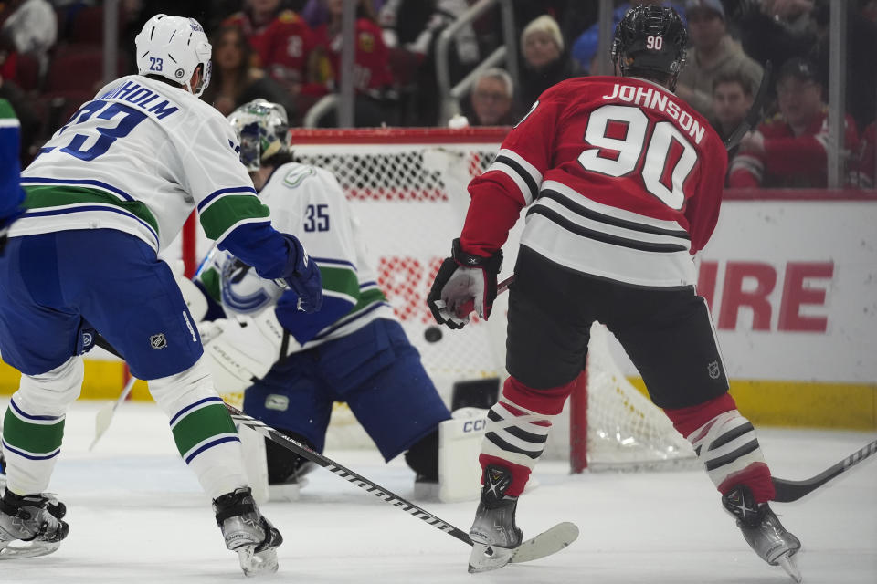 Chicago Blackhawks center Tyler Johnson scores on Vancouver Canucks goaltender Thatcher Demko during the second period of an NHL hockey game, Tuesday, Feb. 13, 2024, in Chicago. (AP Photo/Erin Hooley)