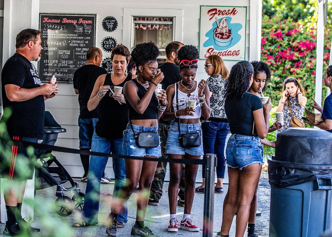 Patrons line up to buy milkshakes at Knaus Berry Farm in Homestead on Feb. 24, 2023. The family-owned business has been in the area since the 1950s.