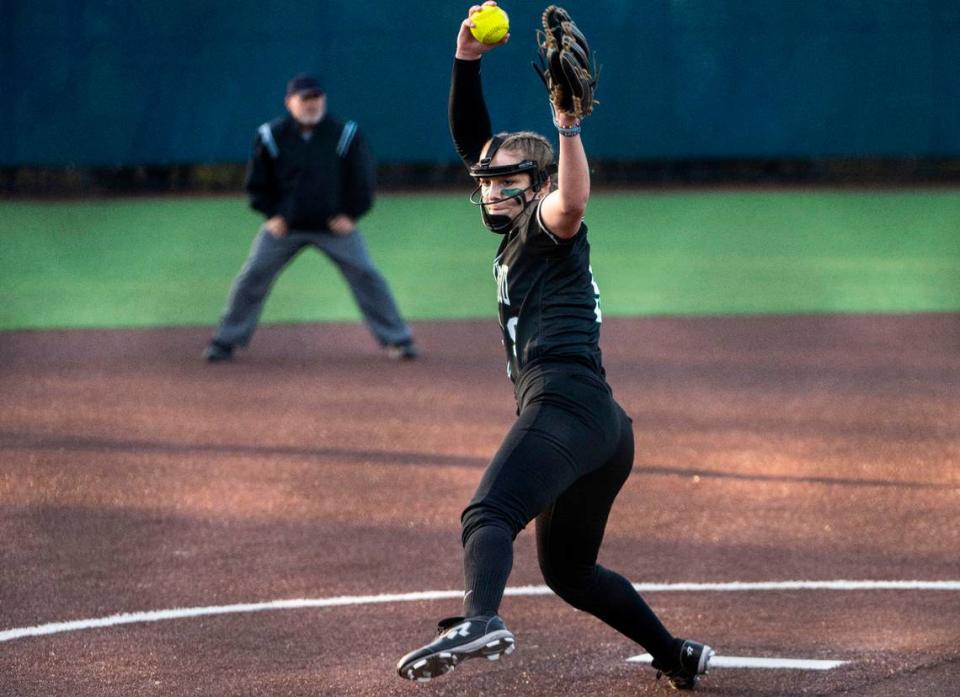 Kentwood pitcher Sarah Wright (9) pitches during the second inning of a non-conference varsity softball game against Auburn Riverside at Auburn Riverside High School in Auburn, Wash. on April 25, 2023. Kentwood defeated Auburn Riverside 3-0.