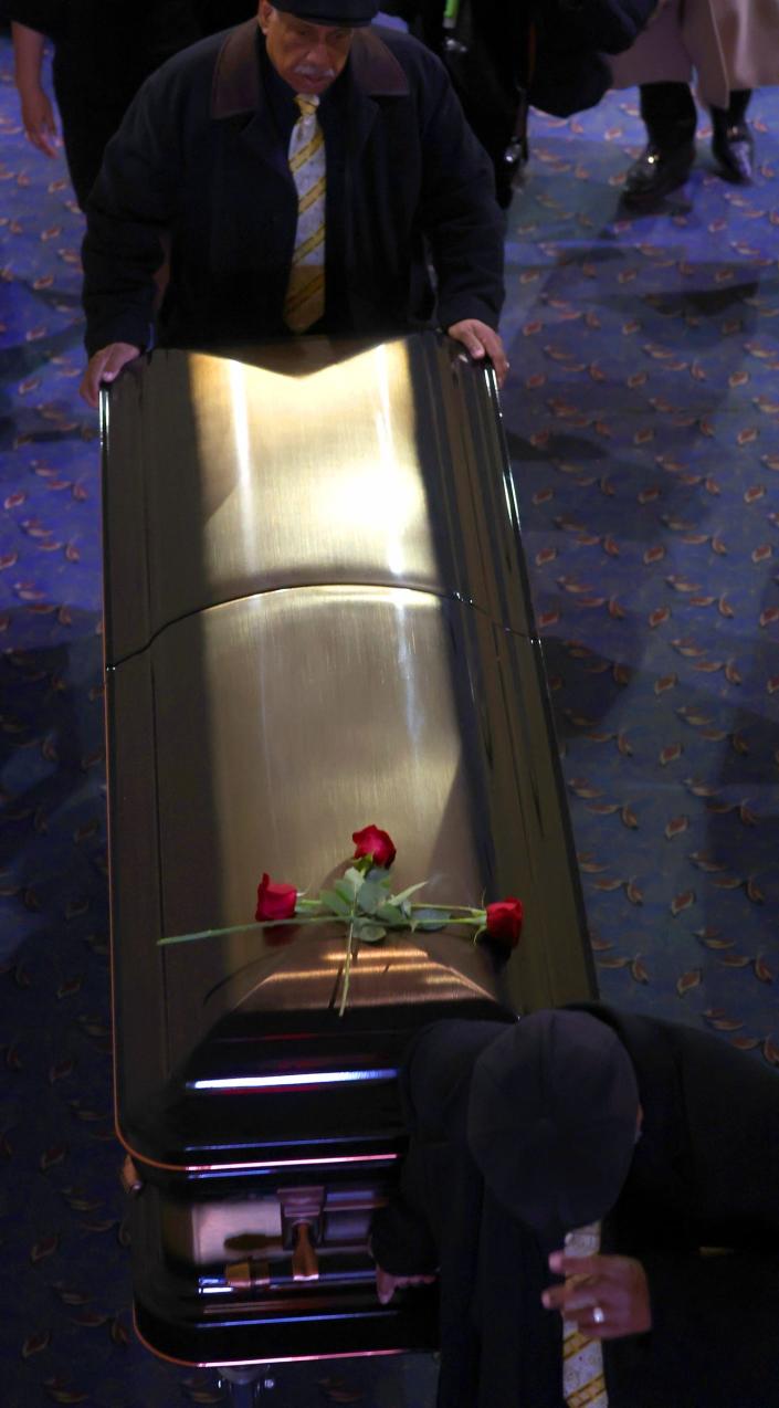 The casket of Barrett Strong, a Motown singer and songwriter who died on Jan. 28, 2023, is brought out toward the hearse at Greater Grace Temple in Detroit on Saturday, March 4, 2023.