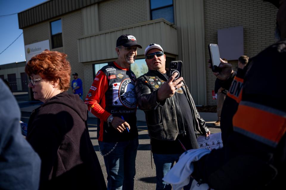 Former NASCAR driver Kyle Petty poses for a photo with Fred Luttmer, of West Valley City, during a stop of the Kyle Petty Charity Ride at Manheim Utah in Woods Cross on Saturday, April 29, 2023. | Spenser Heaps, Deseret News