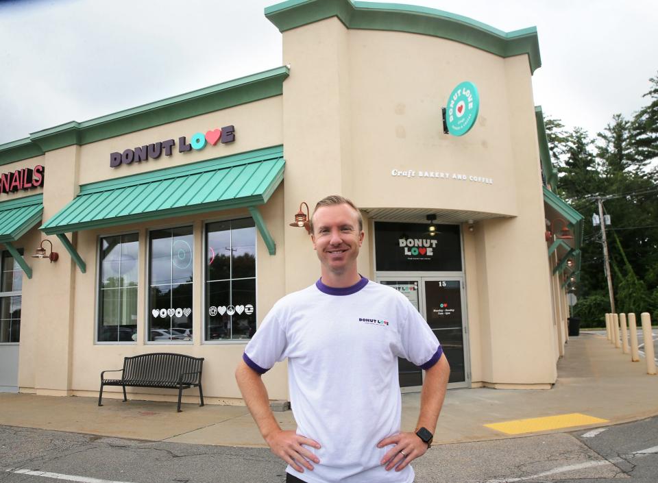 Tyler Goodwin is seen outside Donut Love, which is opening in Exeter.