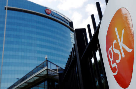 FILE PHOTO: The GlaxoSmithKline building is pictured in Hounslow, west London June 18, 2013. REUTERS/Luke MacGregor/File Photo