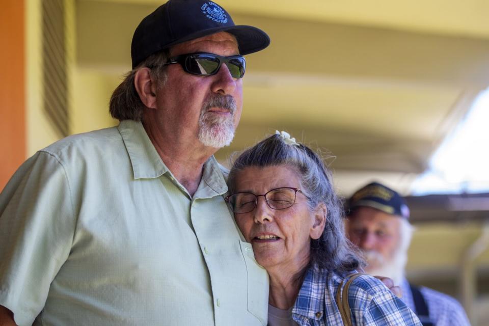 Lori Franz, 71, left, of Canyon Damn hugs Rep. Doug LaMalfa (R-Richvale), following a town hall meeting in Greenville, CA.