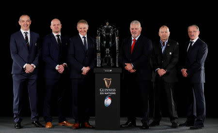 Rugby Union - Six Nations Championship Official Launch - Hurlingham Club, London, Britain - January 23, 2019 Conor O'Shea of Italy, Gregor Townsend of Scotland, Joe Schmidt of Ireland, Warren Gatland of Wales, Eddie Jones of England and Jacques Brunel of France pose at the launch Action Images via Reuters/Matthew Childs