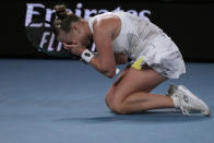 Anna Blinkova of Russia reacts after defeating Elena Rybakina of Kazakhstan in their second round match at the Australian Open tennis championships at Melbourne Park, Melbourne, Australia, Thursday, Jan. 18, 2024. (AP Photo/Andy Wong)