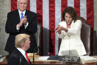 President Donald Trump turns to House Speaker Nancy Pelosi of Calif., as he delivers his State of the Union address to a joint session of Congress on Capitol Hill in Washington, as Vice President Mike Pence watches, on Feb. 5, 2019. (AP Photo/Andrew Harnik)