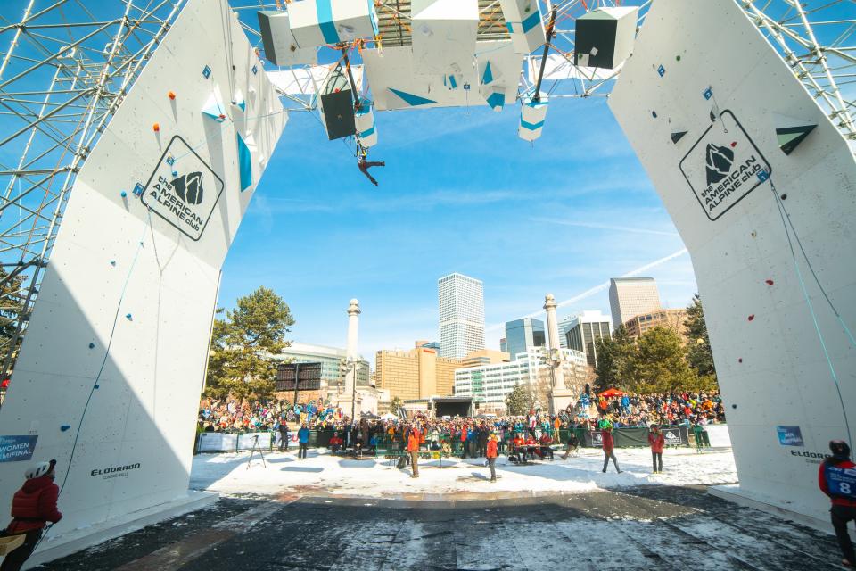 A competitor swings from a plywood box in the Lead event at the 2019 UIAA World Ice Climbing Championships in Denver.