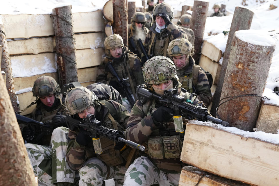 FILE - French soldiers attend the Winter Camp 23 military drills near Tapa, Estonia, Sunday, Feb. 5, 2023. Winter Camp 23 incorporates surge assets from French infantry and UK aviation in addition to the existing forces deployed on regular rotation from France, Denmark and UK. Russia's war on Ukraine will top of agenda when U.S. President Joe Biden and his NATO counterparts meet in the Lithuanian capital Vilnius on Tuesday and Wednesday. (AP Photo/Pavel Golovkin, File)