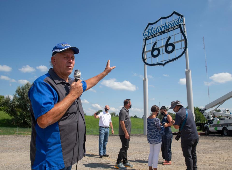 Ron Metzger thanks everyone involved with the installation of the new 32-foot-by-32-foot Route 66 sign on the original poles from Stuckey's at the Motorheads Bar, Grill & Museum after crews from Ace Sign Co. finished their installation, Friday, August 14, 2020, in Springfield, Ill. [Justin L. Fowler/The State Journal-Register] 