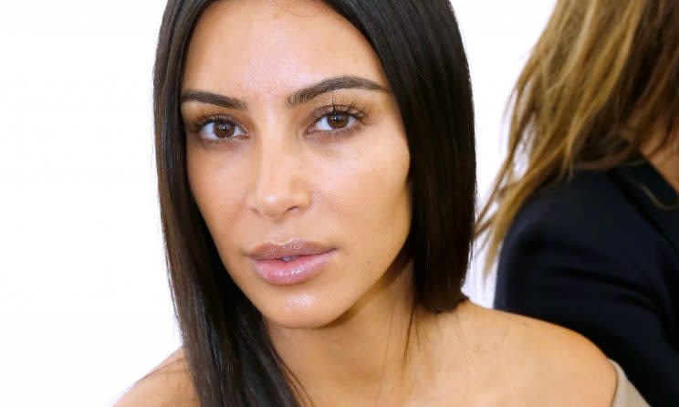 Kim Kardashian at Balenciaga Spring 2017, makeup-free (Photo: Getty Images)