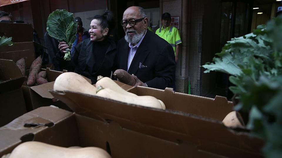 <div>Glide Memorial Church pastor Rev. Cecil Williams (R) and his wife Janice Mirikitani (L) looks at donated produce outside of Glide Memorial Church on November 19, 2014 in San Francisco, California. (Photo by Justin Sullivan/Getty Images)</div>