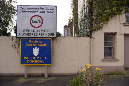 FILE PHOTO: A sign indicates that you have entered the Republic of Ireland by showing that speed limits are now kilometres per hour in English and Irish language in the border town of Pettigo, Ireland October 9, 2016. REUTERS/Clodagh Kilcoyne/File Photo