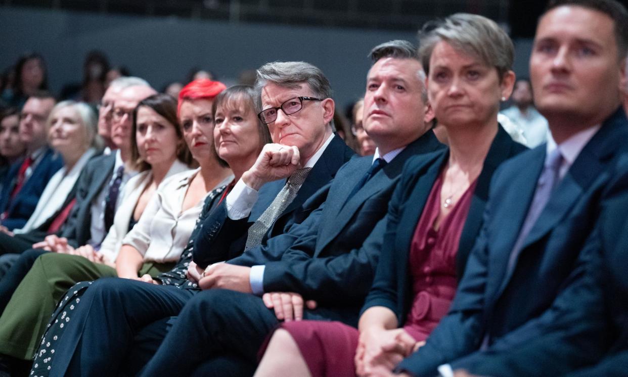 <span>Peter Mandelson (centre) listening to shadow chancellor Rachel Reeves’ keynote speech at Labour conference in October.</span><span>Photograph: Stefan Rousseau/PA</span>