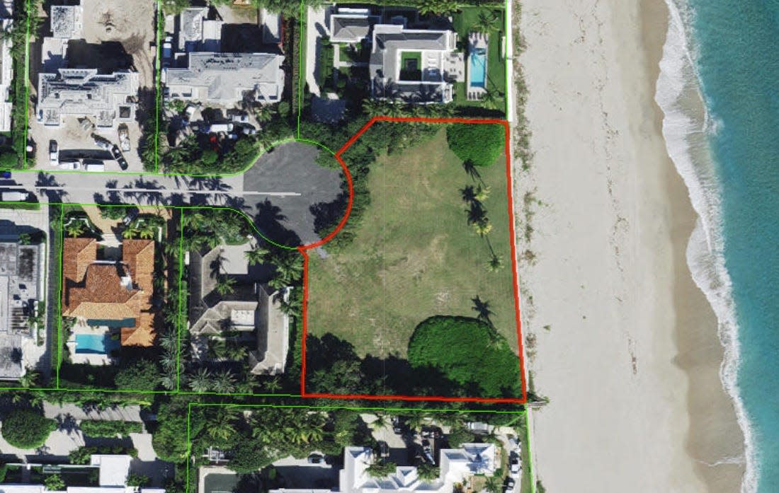An aerial photo shows the vacant beachfront lot, outlined in red, at 108 El Mirasol on the North End of Palm Beach. The double lot of nearly 2 acres has sold for a recorded $85 million.