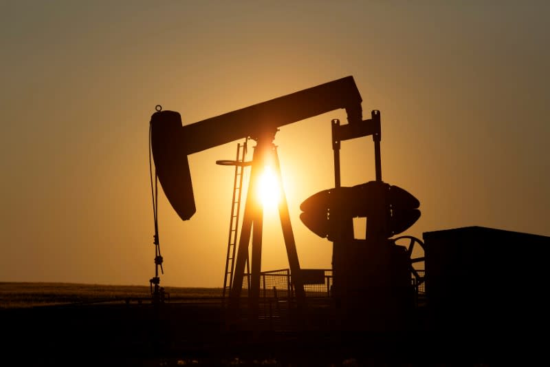 FILE PHOTO: An oil pump jack pumps oil in a field near Calgary