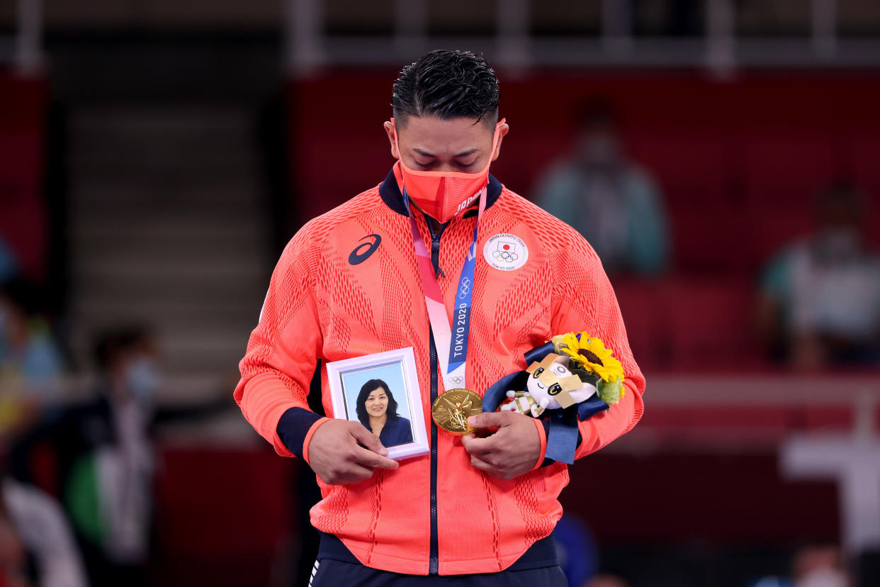 TOKYO, JAPAN - AUGUST 06: Gold medalist Ryo Kiyuna of Team Japan poses with the gold medal for the Men’s Karate Kata on day fourteen of the Tokyo 2020 Olympic Games at Nippon Budokan on August 06, 2021 in Tokyo, Japan. (Photo by Harry How/Getty Images)