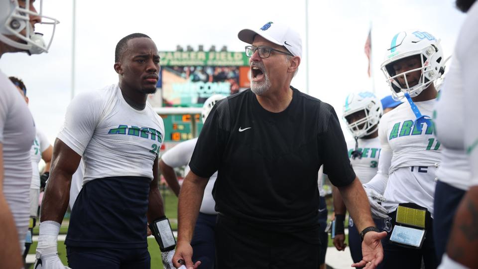 West Florida head coach Pete Shinnick rallies his team prior to the Argos' Gulf South Conference opener against Delta State on Oct. 2, 2021 from Parker Field in Cleveland, Miss.