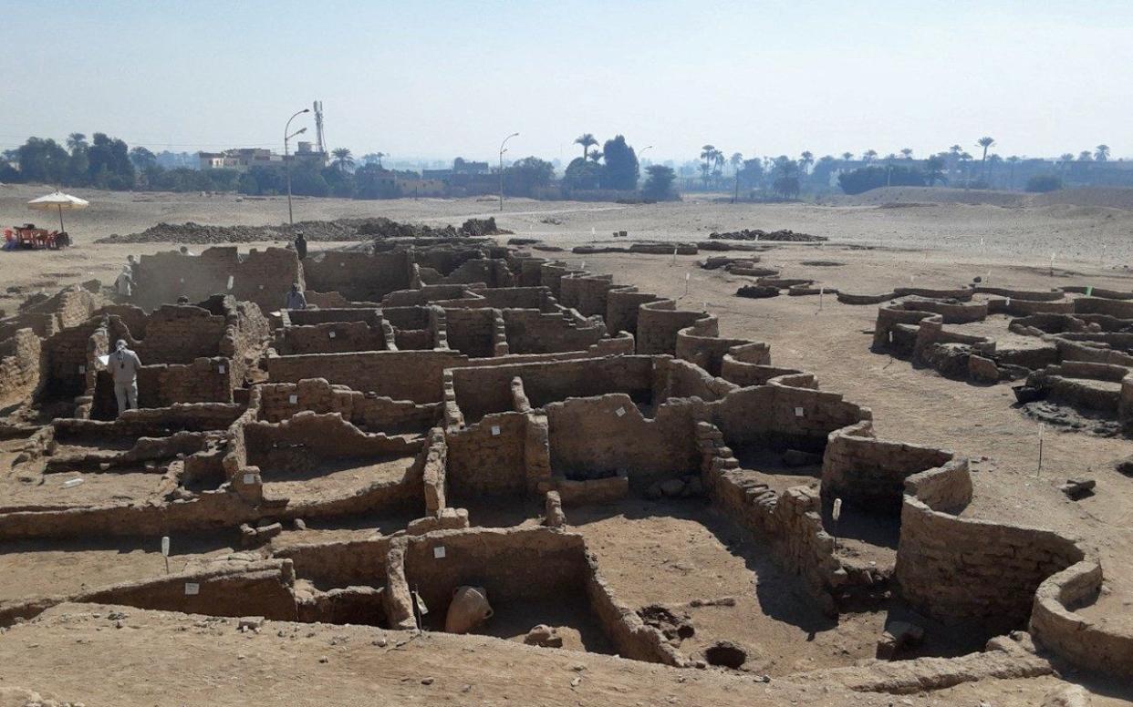 Archaeologists hailed the discovery of "the largest" ancient city found in Egypt, buried under sand for millenia, which experts said was one of the most important finds since unearthing Tutankhamun's tomb. - AFP