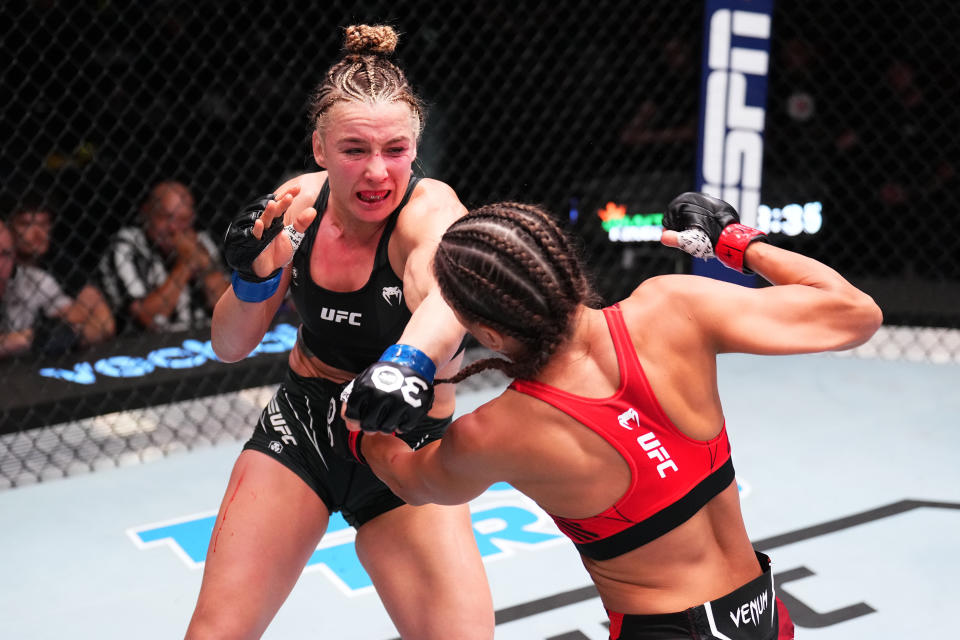 LAS VEGAS, NEVADA – MAY 20: (L-R) Vanessa Demopoulos punches Karolina Kowalkiewicz of Poland in a strawweight fight during the UFC Fight Night event at UFC APEX on May 20, 2023 in Las Vegas, Nevada. (Photo by Chris Unger/Zuffa LLC via Getty Images)