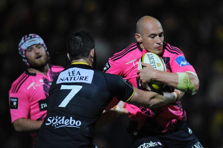 Stade Francais' Sergio Parisse (R) will be back for the away trip to Brive, the Italian having served his ban for a red card against capital rivals Racing