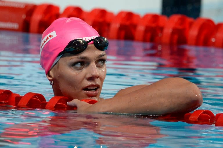 Russia's breaststroke world champion Yuliya Efimova has been suspended from competition over alleged doping