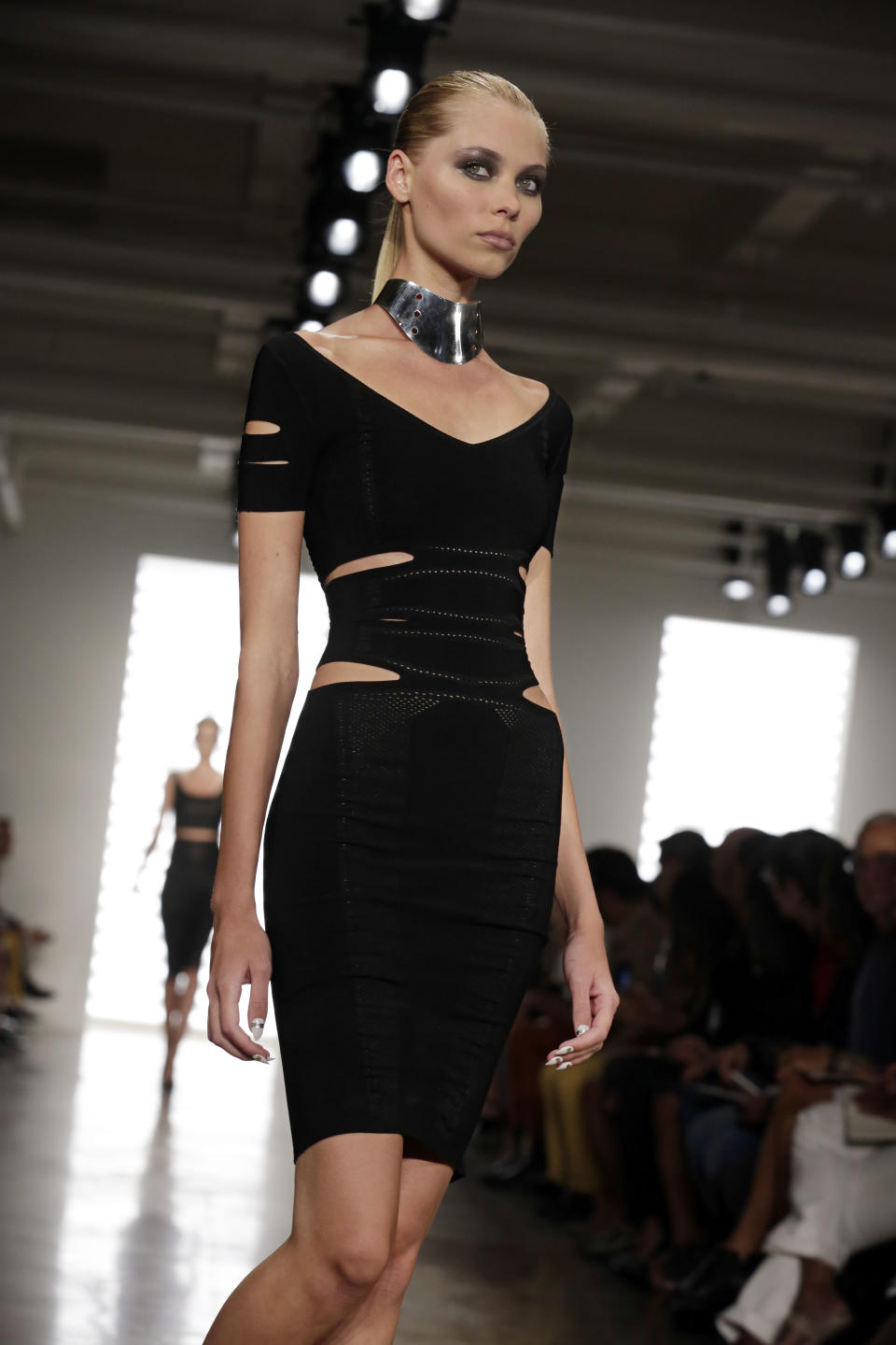 The Cushnie et Ochs Spring 2014 collection is modeled during Fashion Week in New York, Friday, Sept. 6, 2013. (AP Photo/Richard Drew)