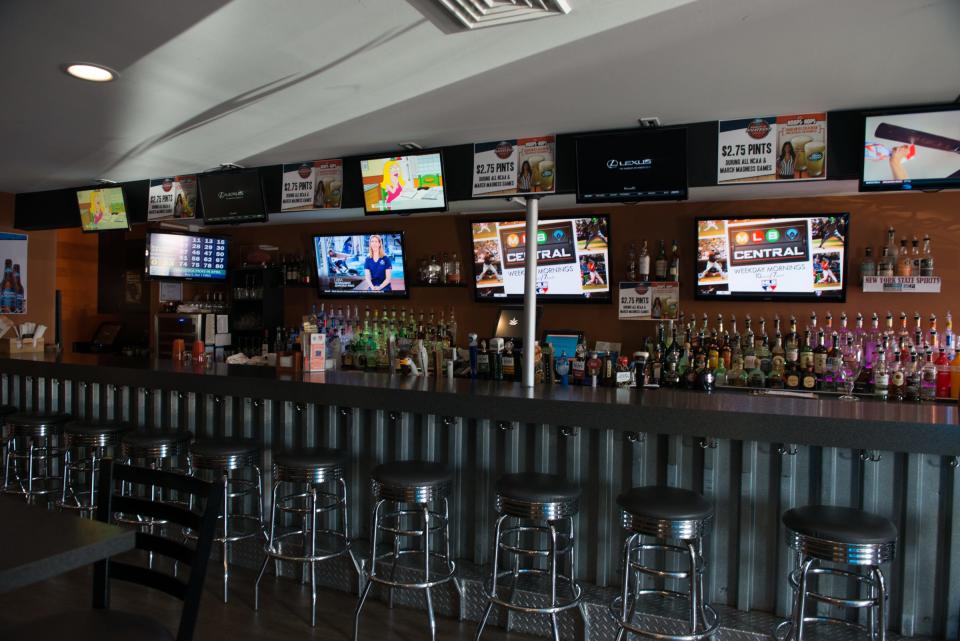 Fireside Grill & Sports Bar's cozy sports bar has 11 televisions tuned to sporting events.