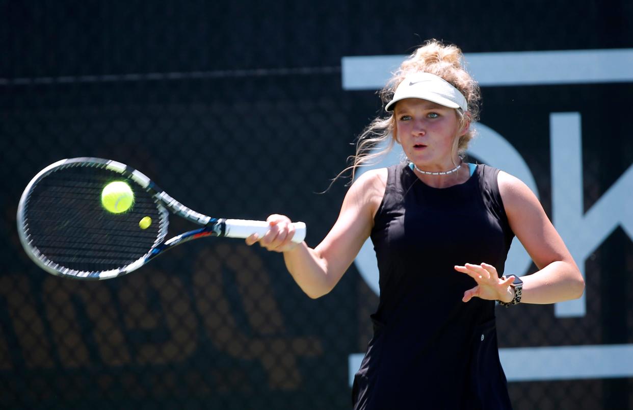 Elk City's McKinley Brewer returns a hit to CHA's Reece Compton during the 4A No. 1 singles match during the high school state girls tennis tournament at the OKC Tennis Center in Oklahoma City, Friday, May, 5, 2023. 