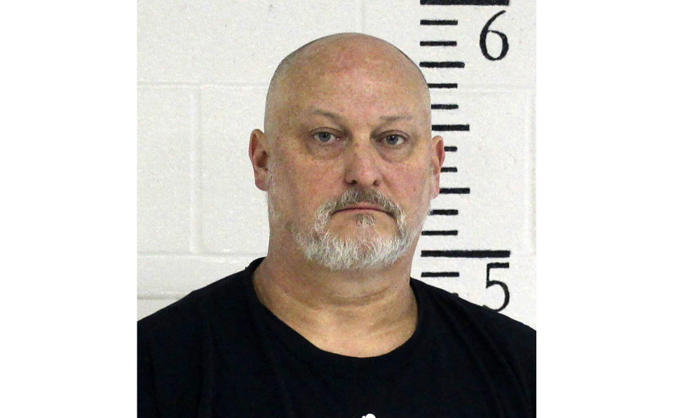 This photo provided by the Crawford County Correctional Facility shows Shawn C. Cranston. Six guns, a variety of ammunition and a pair of sneakers that may match tread marks left at the murder scene were seized during searches of the home and vehicle of the man accused of killing a pregnant Amish woman in her rural Pennsylvania home a month ago. (Crawford County Correctional Facility via AP)