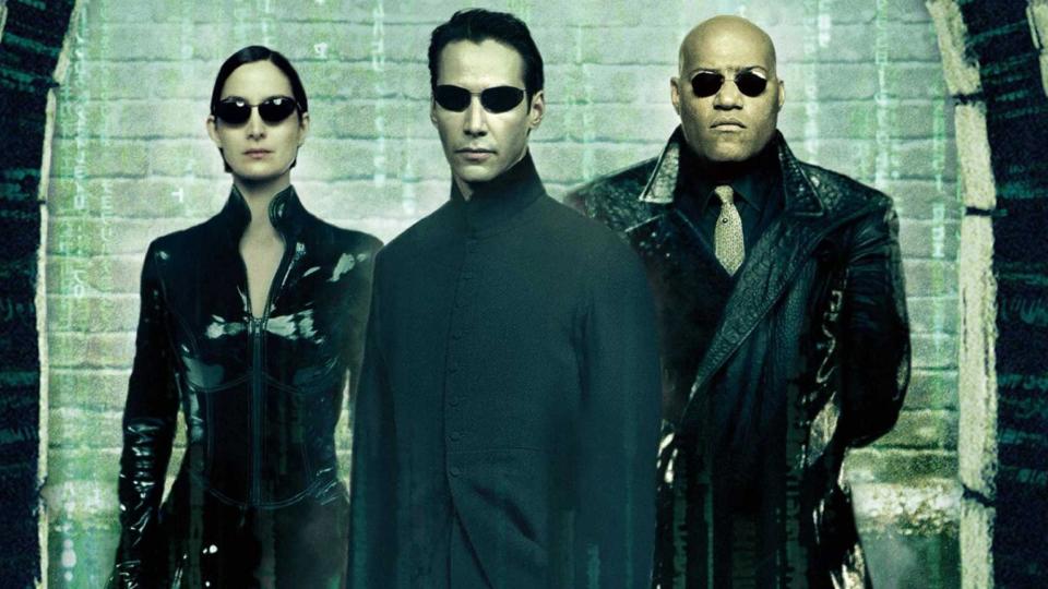 Carrie-Anne Moss, Keanu Reeves and Laurence Fishburne in The Matrix