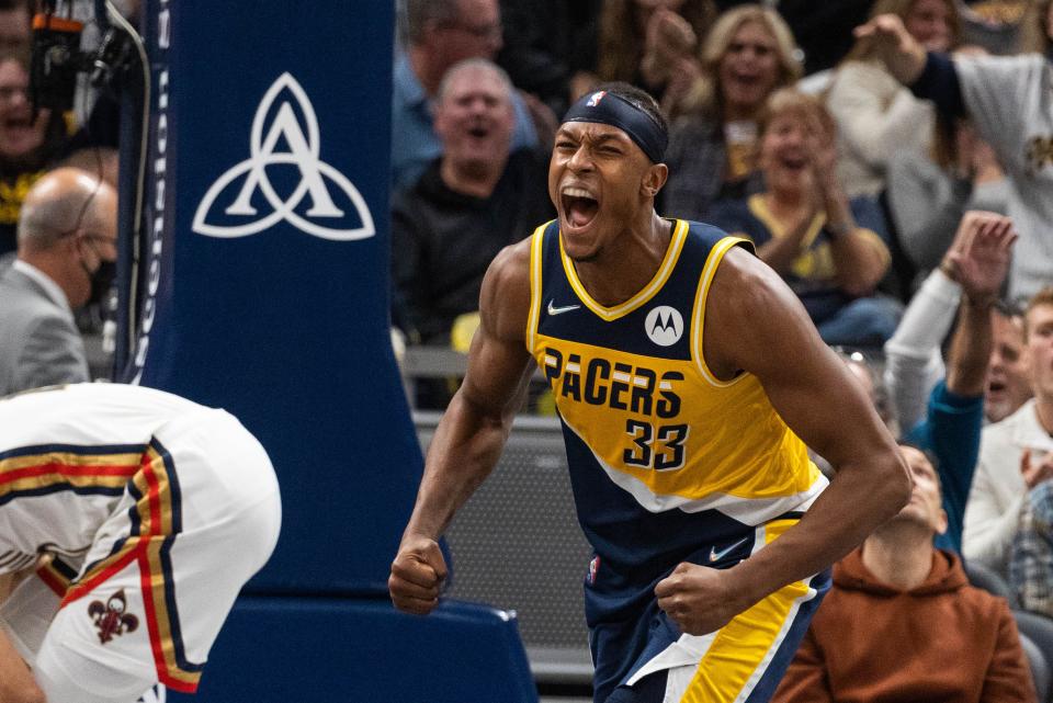 Nov 20, 2021; Indianapolis, Indiana, USA; Indiana Pacers center Myles Turner (33) celebrates a  dunk in the second half  against the New Orleans Pelicans at Gainbridge Fieldhouse. Mandatory Credit: Trevor Ruszkowski-USA TODAY Sports