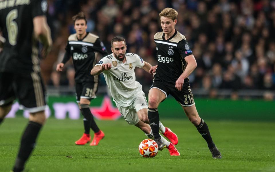 Dani Carvajal of Real Madrid and Frenkie de Jong of Ajax battle - GETTY IMAGES