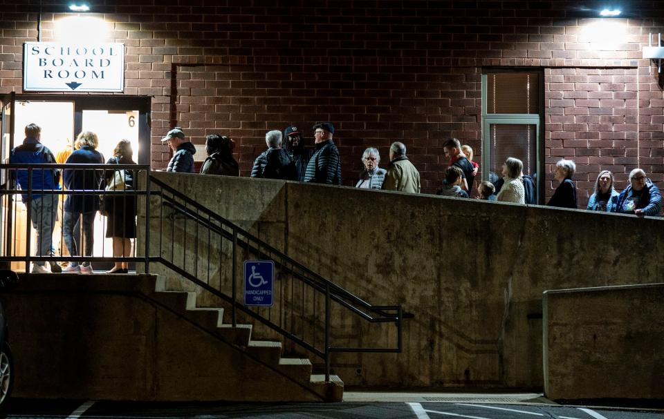 People wait on line outside to get into the Central Bucks School District Board re-org in Doylestown on Monday, Dec. 4, 2023.

[Daniella Heminghaus | Bucks County Courier Times]