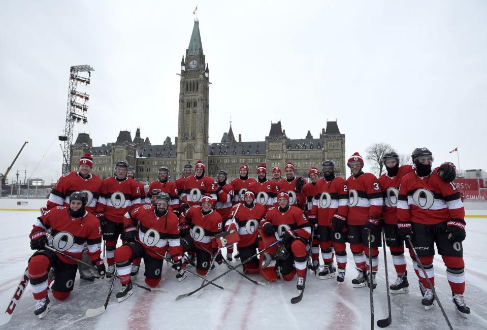 <p>Ottawa Senators pose for a team photo on the Canada 150 Rink on Parliament Hill, ahead of the NHL 100 Classic in Ottawa, which they won 3-0 over the Canadiens. </p>