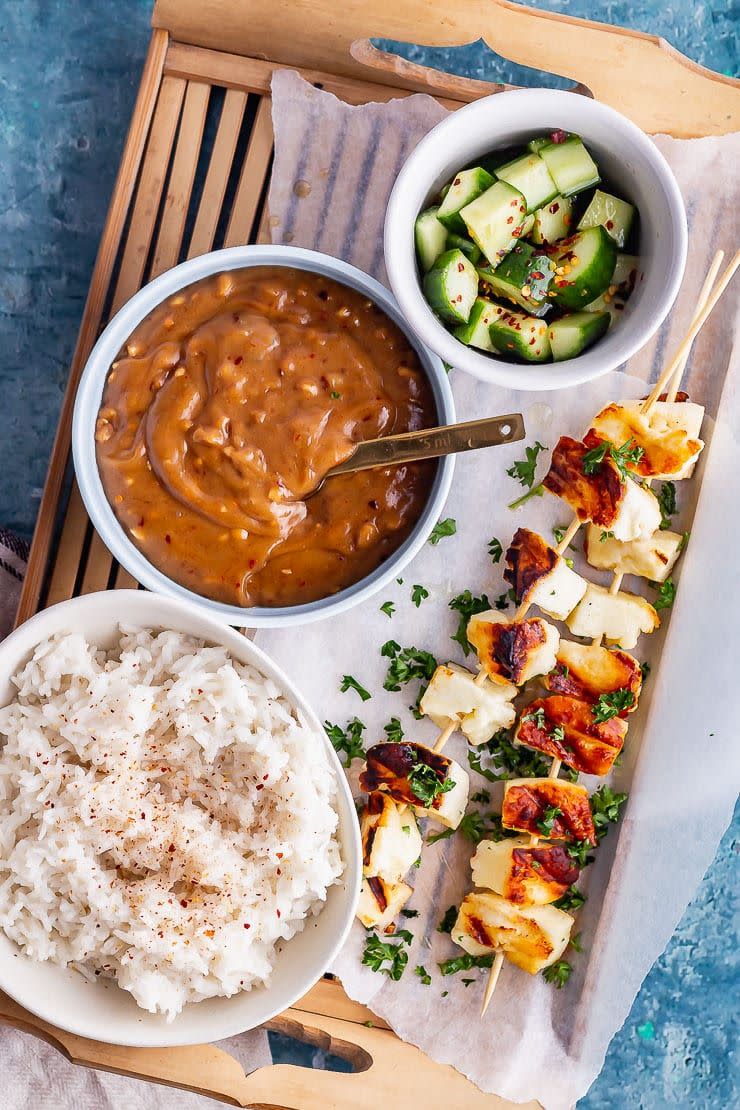 <p>These delicious halloumi skewers are the light and healthy summer dinner that you're craving. And that cucumber salad? Incredible. </p><p>Get the <a href="https://thecookreport.co.uk/grilled-halloumi-skewers/" rel="nofollow noopener" target="_blank" data-ylk="slk:Grilled Halloumi Skewers with Satay Sauce;elm:context_link;itc:0;sec:content-canvas" class="link ">Grilled Halloumi Skewers with Satay Sauce</a> recipe.</p><p>Recipe from <a href="https://thecookreport.co.uk/" rel="nofollow noopener" target="_blank" data-ylk="slk:The Cook Report;elm:context_link;itc:0;sec:content-canvas" class="link ">The Cook Report</a>.</p>