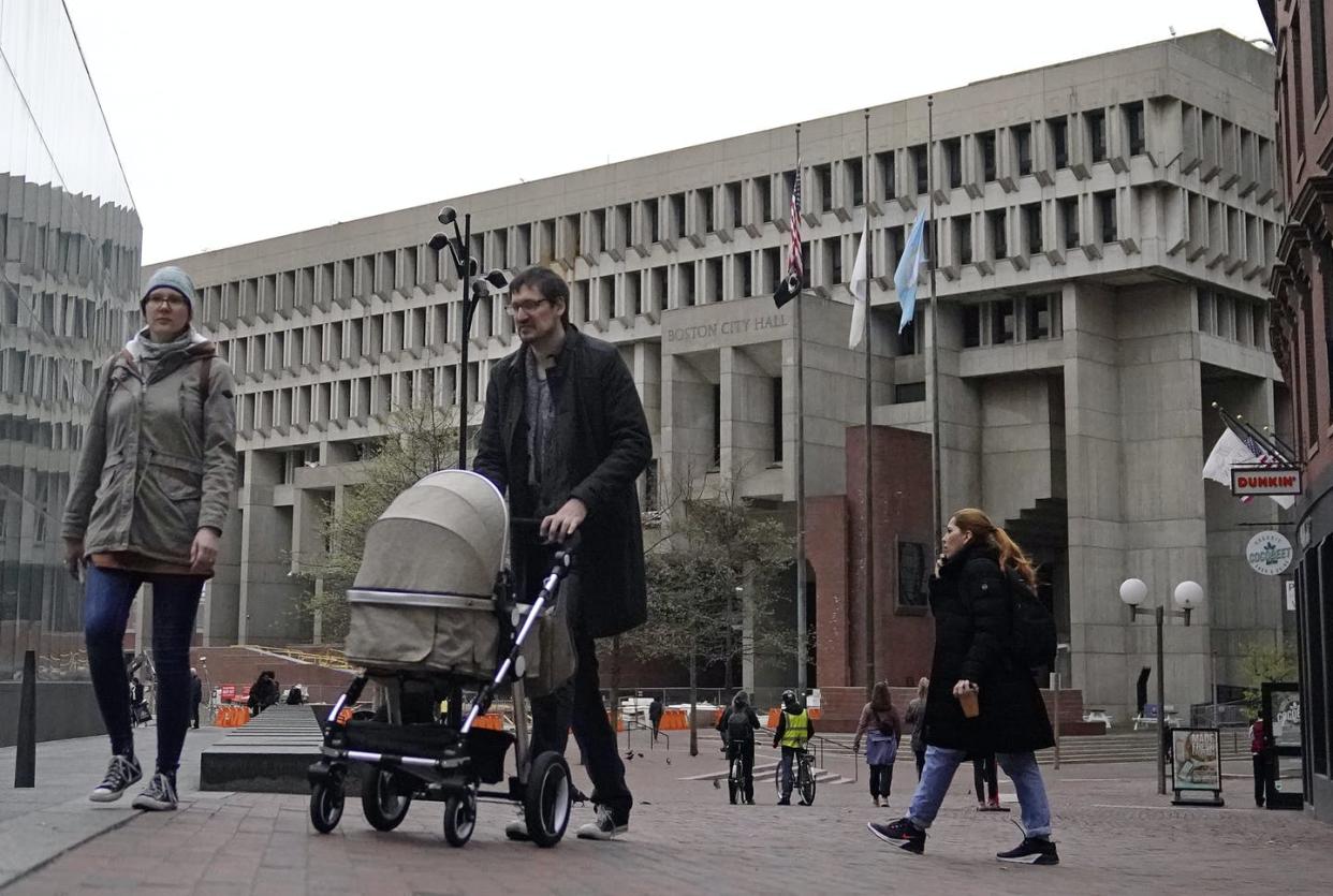 <span class="caption">Pedestrians walk near three flag poles flying the American flag, the Commonwealth of Massachusetts flag, and the City of Boston flag, from left, outside Boston City Hall, May 2, 2022.</span> <span class="attribution"><a class="link " href="https://newsroom.ap.org/detail/Supreme%20Court%20Christian%20Flag%20Boston/2597bcf119554d378bdad17b4e6398a8?Query=boston&mediaType=photo&sortBy=arrivaldatetime:desc&dateRange=Anytime&totalCount=254395&currentItemNo=0" rel="nofollow noopener" target="_blank" data-ylk="slk:AP Photo/Charles Krupa;elm:context_link;itc:0;sec:content-canvas">AP Photo/Charles Krupa</a></span>
